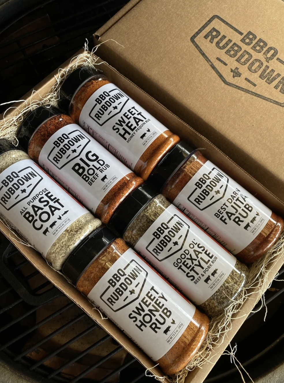 Manready Mercantile rustic Texas gift box with leather goods, candle, and stamped wooden items